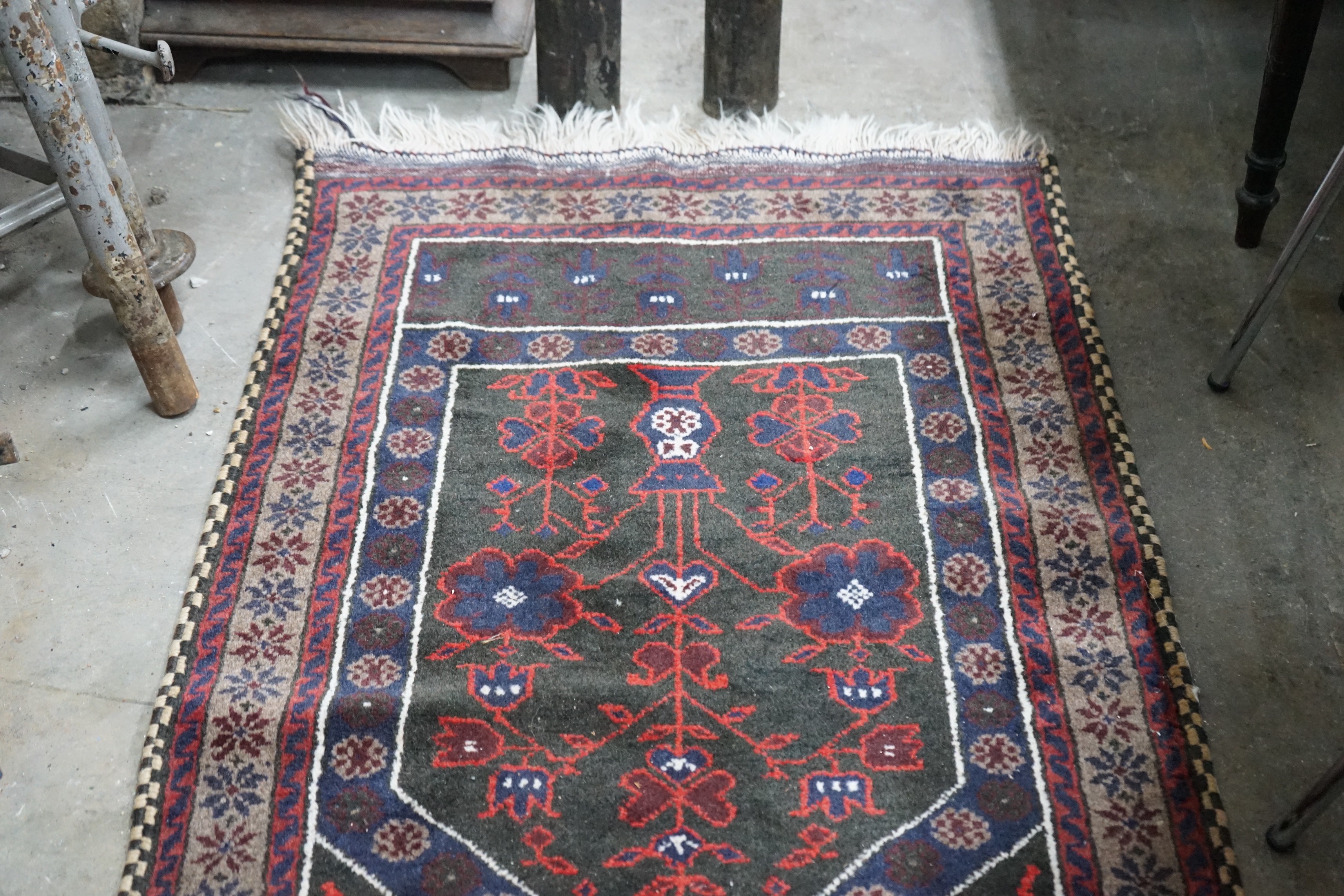 A Belouch blue ground prayer rug, 140 x 74cm